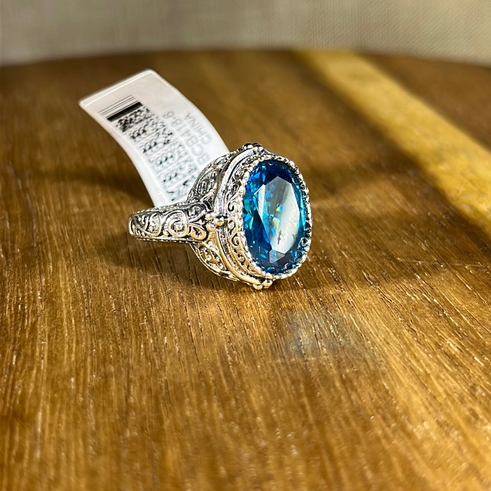 Blue Cubic Zirconia Rhodium Over
Sterling Silver Center Design Ring Size 6